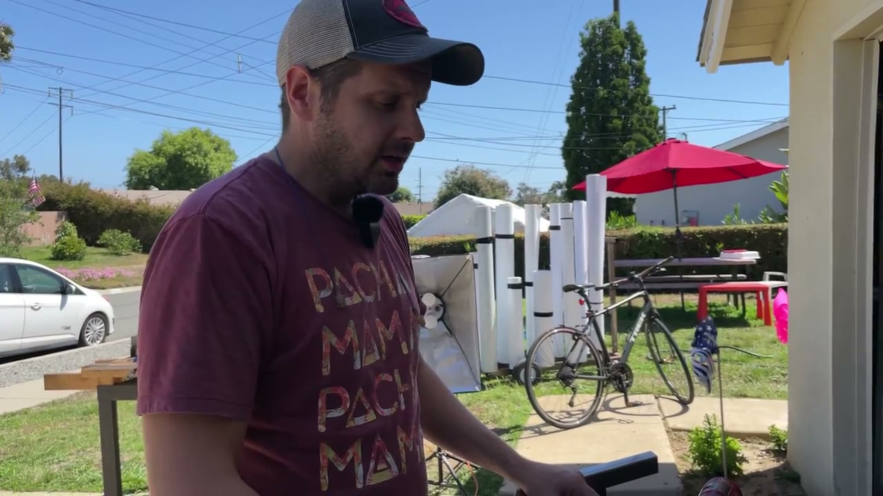 The builder talking through his GrandDaddy build in the driveway