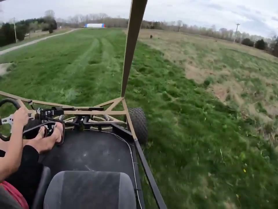 POV of the GrandDaddy heading across open ground