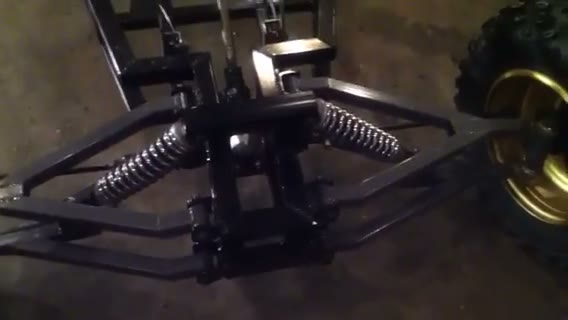 Rear suspension and coilover detail on the Arachnid frame