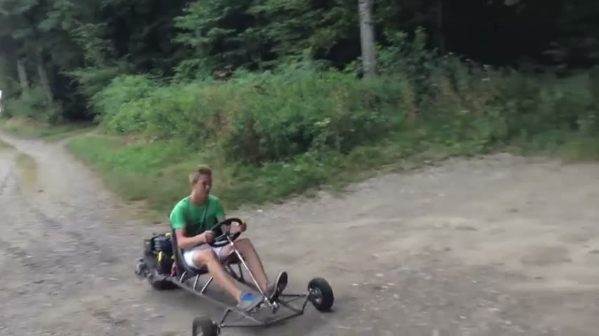 The SpiderCart driving along a forest trail