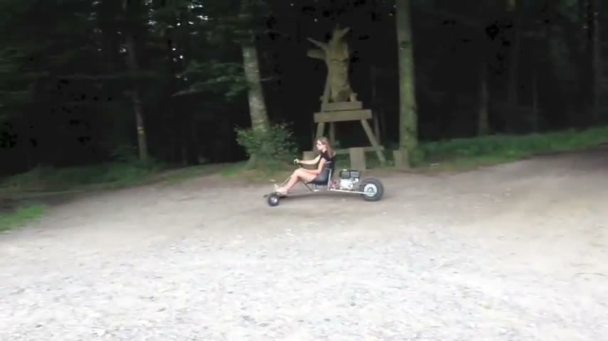 The SpiderCart sliding through a gravel corner