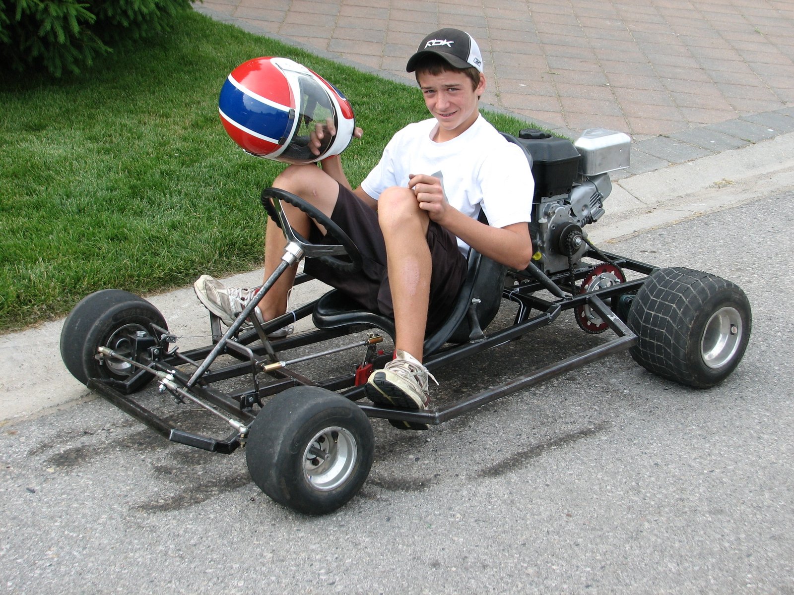 Young rider with helmet in a Black Widow