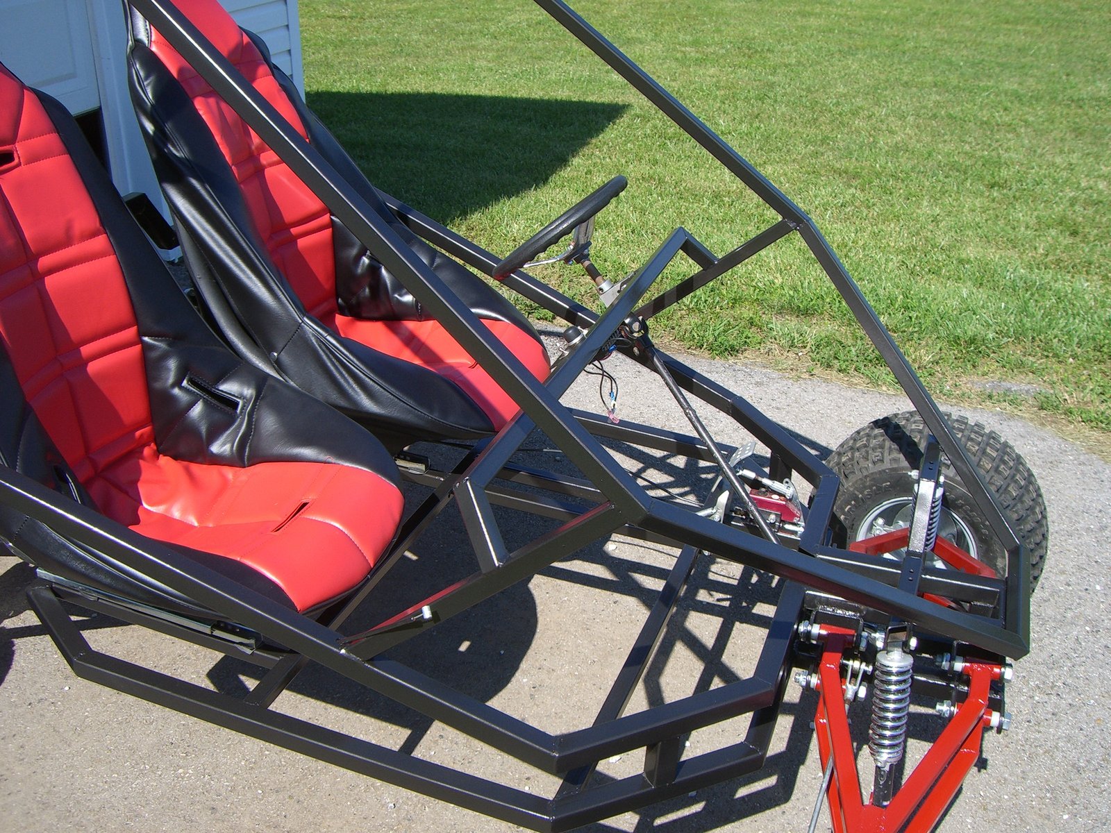 Twin red bucket seats detail