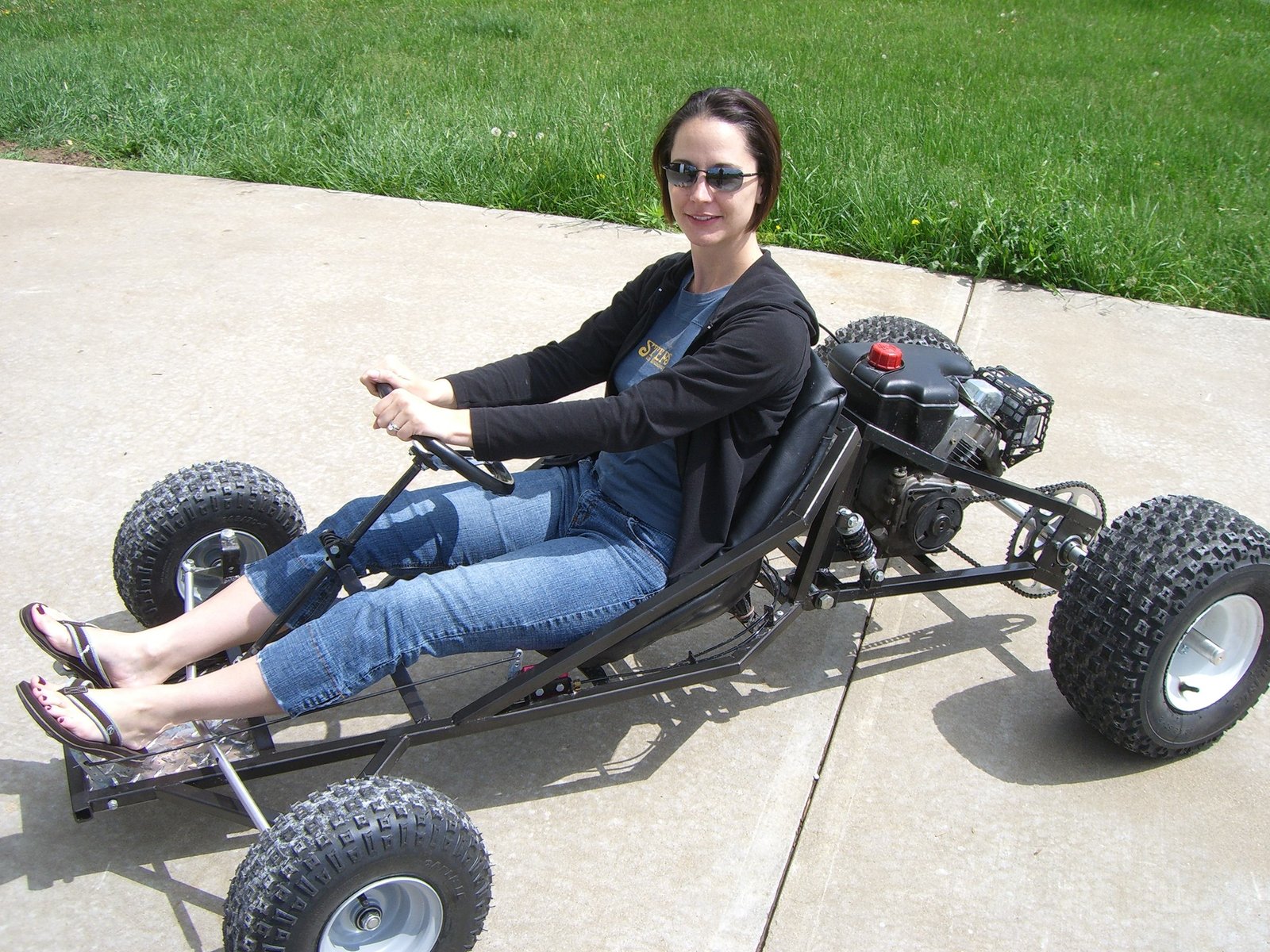 Rider driving the Tarantula on pavement